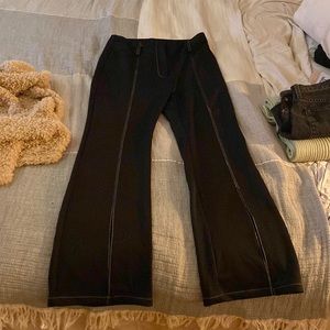 Dolls kill | “hot & delicious” black high waisted flare pants